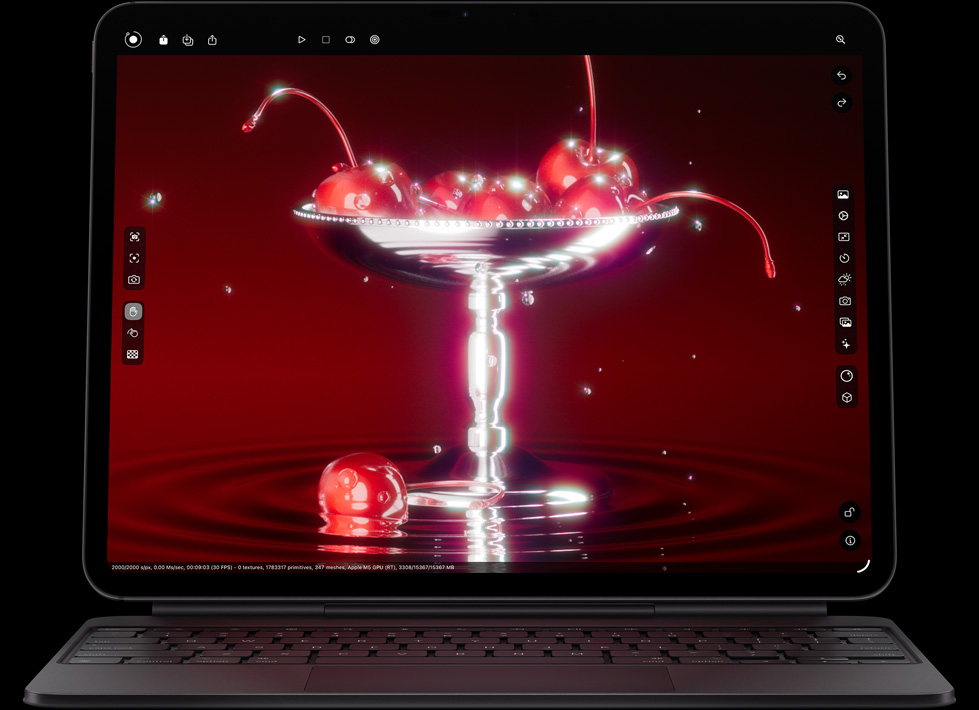 iPad Pro, orientation paysage, face avant, noir sidéral, angles arrondis, cadre d’écran noir, fixé à un Magic Keyboard en orientation paysage, face avant, couleur noire, écran affichant une app de retouche photo avec une image éclatante de cerises dans une coupe en forme de verre à martini avec des gouttes d’eau